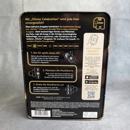 Die Hitster: Celebration-Box von Jumbo Spiele zeigt Anleitung, Jahreszahlen und App-Infos in deutscher Sprache. Das Design zeigt gelbe und weiße Schrift auf schwarzem Grund, mit dem Jumbo-Elefanten-Logo oben rechts.