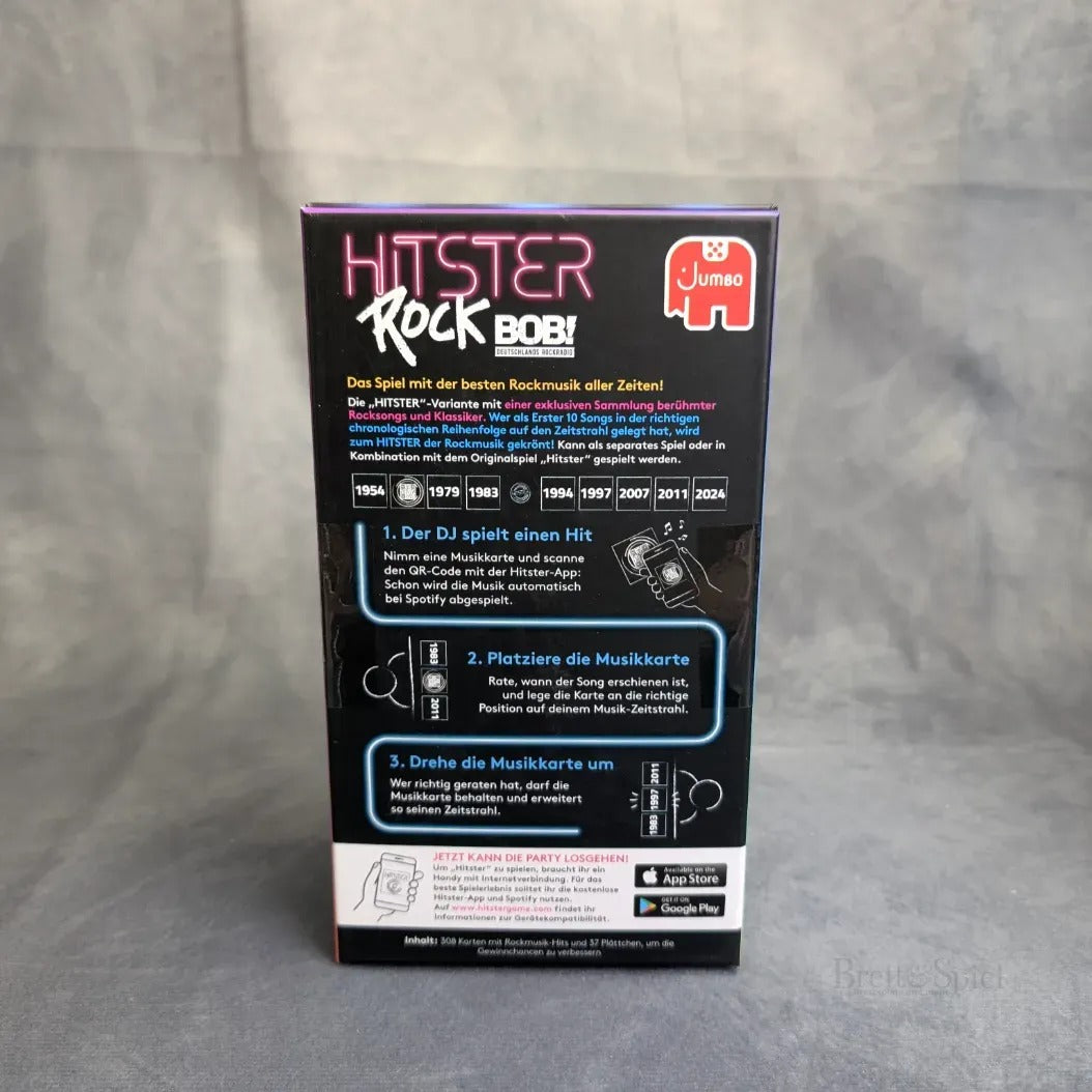Die Rückseite der Hitster: Rock von Pegasus Spiele zeigt die deutsche Spielanleitung, eine Smartphone-Grafik, die Rockmusik-Jahre 1956-2024, einen grauen Hintergrund mit dem Pegasus Spiele-Logo und Infos zu den Rocksongs aus der HITSTER Rock-Erweiterung.
