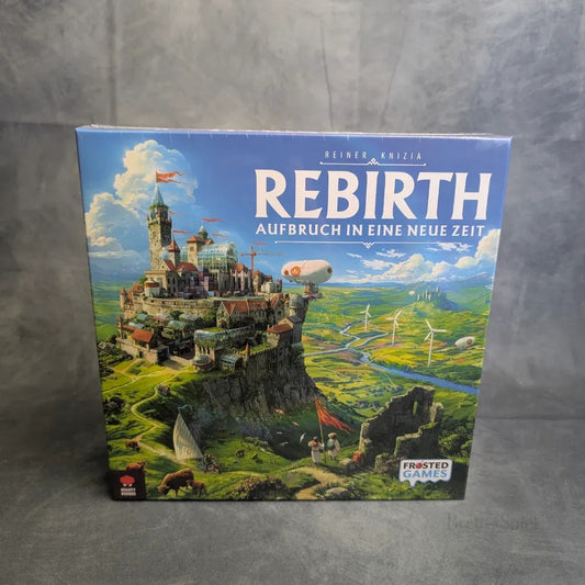 Die Wiedergeburt: Aufbruch in eine neue Zeit Brettspiel von Frosted Games, entworfen von Reiner Knizia, zeigt auf der Schachtel eine Stadt auf einem Hügel mit mittelalterlichen Burgen und Windrädern.