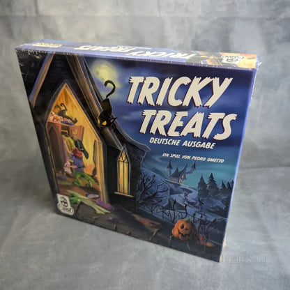 Eine Box mit einer Person im Fenster - perfekt für Ihr nächstes Halloween mit Tricky Treats von JoeKas World GmbH, ideal für Familienspiele oder Trick or Treat Spaß.